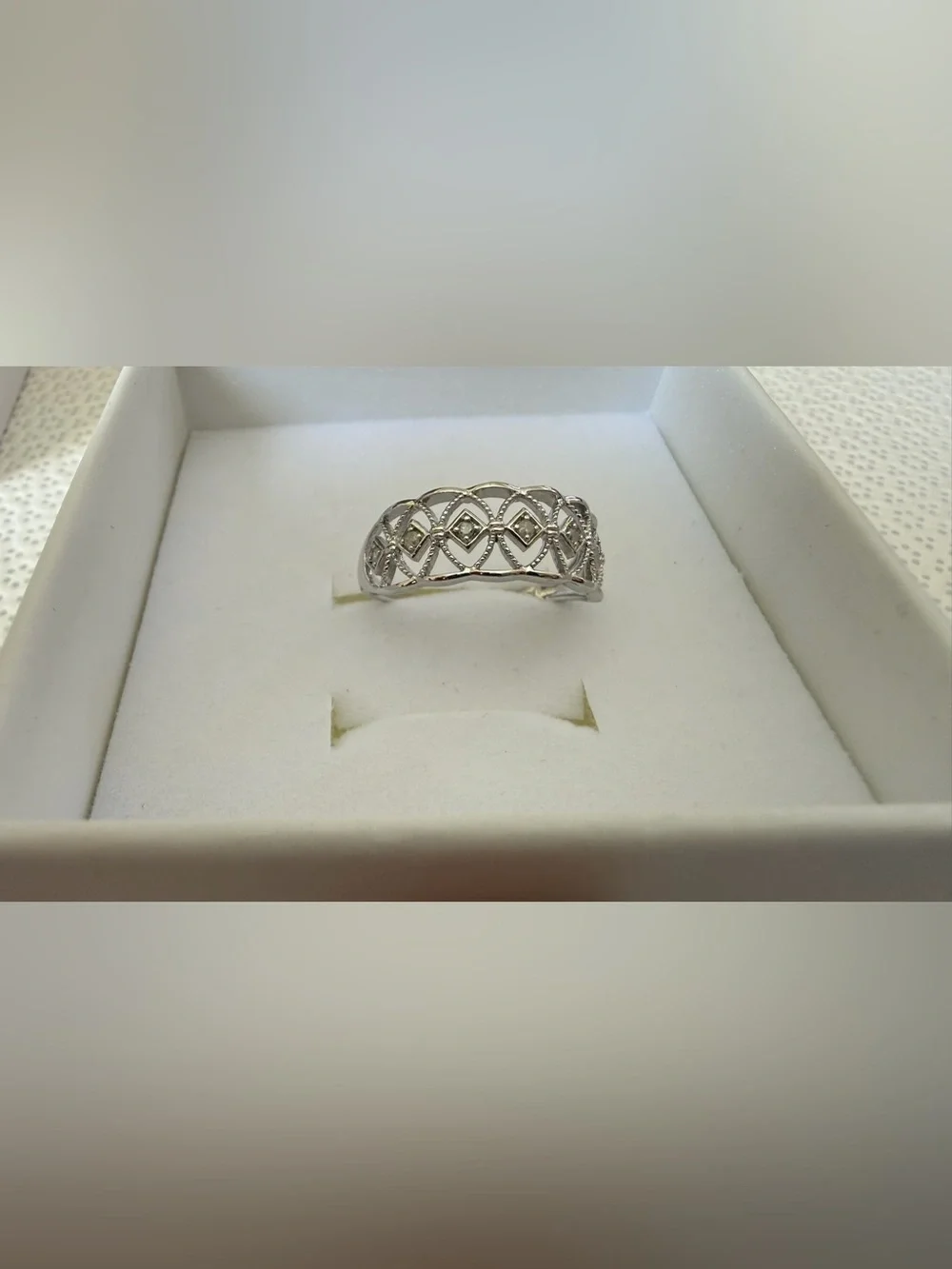 NWB DELMAR Sterling Silver Diamond Cutout Ring - 0.10ct.